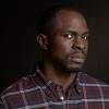 24:  LIVE ANOTHER DAY:  Gbenga Akinnagbe as Erik Ritter.  24:  LIVE ANOTHER DAY is set to premiere Monday, May 5 with a special season premiere, two-hour episode (8:00-10:00 PM ET/PT) on FOX. &#xa9;2014 Fox Broadcasting Co.  Cr:  Daniel Smith/FOX