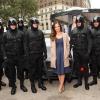 ALMOST HUMAN: Actress Minka Kelly (C) is guarded by MX-43 android policemen during FOX's "Almost Human-(hattan) Experience" at Herald Square on Wednesday, Oct. 30, 2013 in New York. CR: Omar Vega/Invision for FOX