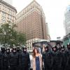 ALMOST HUMAN: Actress Minka Kelly (C) is guarded by MX-43 android policemen during FOX's "Almost Human-(hattan) Experience" at Herald Square on Wednesday, Oct. 30, 2013 in New York. CR: Omar Vega/Invision for FOX