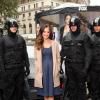 ALMOST HUMAN: Actress Minka Kelly (C) is guarded by MX-43 android policemen during FOX's &quot;Almost Human-(hattan) Experience&quot; at Herald Square on Wednesday, Oct. 30, 2013 in New York. CR: Omar Vega/Invision for FOX