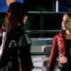 Arrow -- "The Thanatos Guild" -- Image Number: AR616a_0274.jpg -- Pictured (L-R): Katrina Law as Nyssa Al-Ghul and Willa Holland as Thea Queen/Speedy -- Photo: Shane Harvey/The CW -- ÃÂ© 2018 The CW Network, LLC. All rights reserved.