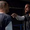 Arrow -- "Crossing Lines" -- Image Number: AR703a_0200b -- Pictured (L-R): Vinnie Jones as Danny "Brick" Brickwell and Stephen Amell as Oliver Queen/Green Arrow  -- Photo: Jack Rowand/The CW -- ÃÂ© 2018 The CW Network, LLC. All Rights Reserved.