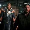 Arrow -- "Present Tense" -- Image Number: AR804b_0635b.jpg -- Pictured (L-R): LaMonica Garrett as The Monitor and Stephen Amell as Oliver Queen/Green Arrow -- Photo: Jack Rowand/The CW -- © 2019 The CW Network, LLC. All Rights Reserved.