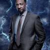 Black Lightning -- Image BLK_SINGLES_HENDERSON.jpg -- Pictured: Damon Gupton as Inspector Bill Henderson -- Photo: Mark Hill/The CW -- ÃÂ© 2018 The CW Network, LLC. All rights reserved