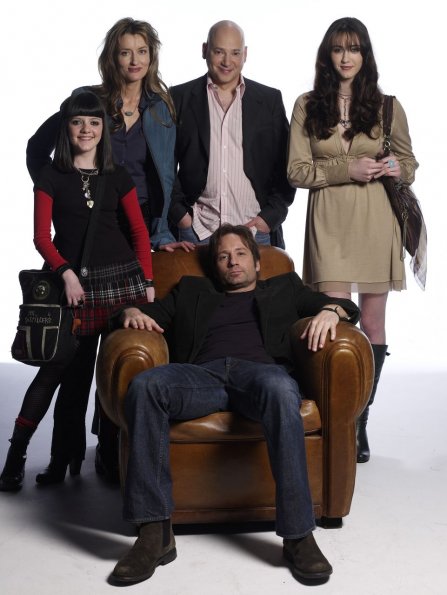 Starring in Showtime's stylish new comedy series (as  yet untitled) are:  Center, seated in the chair:  David Duchovny  ("Hank").  Standing behind Duchovny is left to right: Madeleine Martin  ("Becca" - the daughter), Natascha McElhone ("Karen" - the ex-girlfriend), Evan  Handler ("Charlie" - the best friend) and Madeline Zima  ("Mia").