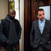 "It Serves You Right to Suffer" -- When Shinwell comes to Holmes and Watson for help after he\'s framed for a gang killing, they have three days to find the real murderer before he is arrested and sent back to jail, on ELEMENTARY, Sunday, Dec. 11 (10:00-11:00 PM, ET/PT) on the CBS Television Network. The episode was directed by series star Aidan Quinn, in his television directorial debut. Pictured (L-R) Nelsan Ellis  as  Shinwell Johnson and Jonny Lee Miller as  Sherlock Holmes  Photo: Michael Parmelee/CBS ÃÂ©2016 CBS Broadcasting, Inc. All Rights Reserved