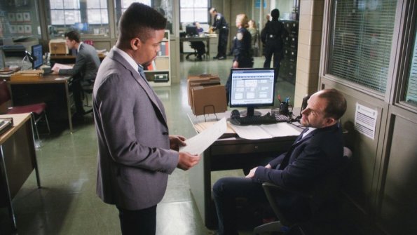"Moving Targets" -- When a reality show contestant is murdered, Holmes and Watson zero in on another competitor as a suspect, a former war criminal who may be the most skilled killer they\'ve ever pursued. Also, for the first time since he attacked Sherlock, Shinwell reaches out to Joan to ask for a favor, on ELEMENTARY, Sunday, May 7 (10:00-11:00 PM, ET/PT) on the CBS Television Network. Series star Lucy Liu directed the episode.  Pictured Jon Michael Hill as Detective Marcus Bell  and Jonny Lee Miller as Sherlock Holmes Photo: Best Possible Screen Grab/CBS ÃÂ©2017 CBS Broadcasting, Inc. All Rights Reserved