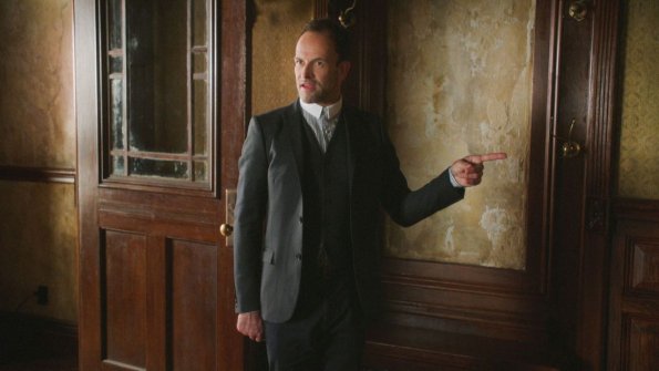 "Sand Trap" -- Holmes and Watson\'s search for the killer of a woman found encased in cement takes them inside the clean technology industry. Also, Watson takes a giant leap forward regarding her interest in adoption, on ELEMENTARY, Monday, June 18 (10:00-11:00, ET/PT), on the CBS Television Network. Pictured  Jonny Lee Miller as Sherlock Holmes Photo: Best Possible Screen Grab/CBS ÃÂ©2018 CBS Broadcasting, Inc. All Rights Reserved