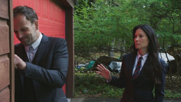 "Sand Trap" -- Holmes and Watson\'s search for the killer of a woman found encased in cement takes them inside the clean technology industry. Also, Watson takes a giant leap forward regarding her interest in adoption, on ELEMENTARY, Monday, June 18 (10:00-11:00, ET/PT), on the CBS Television Network. Pictured (L-R) Jonny Lee Miller as Sherlock Holmes and  Lucy Liu as Joan Watson  Photo: Best Possible Screen Grab/CBS ÃÂ©2018 CBS Broadcasting, Inc. All Rights Reserved