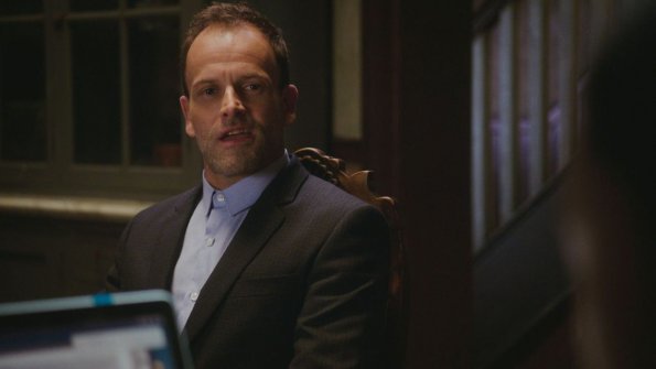 "Sand Trap" -- Holmes and Watson\'s search for the killer of a woman found encased in cement takes them inside the clean technology industry. Also, Watson takes a giant leap forward regarding her interest in adoption, on ELEMENTARY, Monday, June 18 (10:00-11:00, ET/PT), on the CBS Television Network. Pictured  Jonny Lee Miller as Sherlock Holmes Photo: Best Possible Screen Grab/CBS ÃÂ©2018 CBS Broadcasting, Inc. All Rights Reserved
