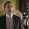 "Nobody Lives Forever" -- Holmes\' former sobriety sponsor, Alfredo (Ato Essandoh), asks for his help with an illegal endeavor in order to save his brother. Also, Holmes and Watson investigate the poisoning of a biology professor who was working on a secret genetics project prior to being killed, on ELEMENTARY, Monday, June 25 (10:00-11:00, ET/PT), on the CBS Television Network. . Pictured  Jonny Lee Miller as Sherlock Holmes Photo: Best Possible Screen Grab/CBS ÃÂ©2018 CBS Broadcasting, Inc. All Rights Reserved
