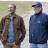 "The List" -- Behind the scenes of the CBS series NCIS: NEW ORLEANS, scheduled to air on the CBS Television Network. Pictured L-R: Scott Bakula and Director Michael Zinberg Photo: Skip Bolen/CBS ÃÂ©2015 CBS Broadcasting, Inc. All Rights Reserved