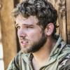 "Other Lives" -- While on an evidence-collecting mission in Syria, Jason and the SEAL Team find innocent civilians in desperate need of rescue just as enemy forces close in on them. Also, while on the mission, the team debates whether or not to tell Ray that his wife has gone into labor, on SEAL TEAM, Wednesday, Oct. 4 (9:00-10:00 PM, ET/PT) on the CBS Television Network. Pictured: Max Thieriot as Clay Spenser.    Photo: Erik Voake/CBSÃÂ©2017 CBS Broadcasting, Inc. All Rights Reserved