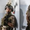 "Other Lives" -- While on an evidence-collecting mission in Syria, Jason and the SEAL Team find innocent civilians in desperate need of rescue just as enemy forces close in on them. Also, while on the mission, the team debates whether or not to tell Ray that his wife has gone into labor, on SEAL TEAM, Wednesday, Oct. 4 (9:00-10:00 PM, ET/PT) on the CBS Television Network. Pictured: Neil Brown Jr. as Ray.   Photo: Erik Voake/CBSÃÂ©2017 CBS Broadcasting, Inc. All Rights Reserved