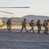 "The Cost of Doing Business" -- After Jason lies about the severity of his concussion to get cleared for combat, he and the SEAL Team plan a final mission to avenge Echo Team\'s deaths once and for all before they return home from deployment, on the first season finale of SEAL TEAM, Wednesday, May 16 (9:01-10:00 PM, ET/PT) on the CBS Television Network. Pictured L to R: Max Thieriot as Clay Spenser , AJ Buckley as Sonny Quinn, David Boreanaz as Jason hayes ,  Toni Trucks as Lisa davis and Judd Lormand as Blackburn. Photo: Erik Voake/CBS ÃÂ©2018 CBS Broadcasting, Inc. All Rights Reserved