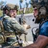 "All Along the Watchtower: Part 2" -- While on a mission abroad to protect U.S. ambassador Nicole Marsden (Khandi Alexander), Bravo Team must fight off enemy attackers trying to infiltrate their compound, on SEAL TEAM, Wednesday, Nov. 6 (9:01-10:00 PM, ET/PT) on the CBS Television Network. Pictured L to R: Max Thieriot as Clay Spenser and AJ Buckley as Sonny Quinn. Photo: Erik Voake/CBS 2019 CBS Broadcasting, Inc. All Rights Reserved.