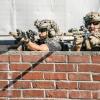 "All Along the Watchtower: Part 2" -- While on a mission abroad to protect U.S. ambassador Nicole Marsden (Khandi Alexander), Bravo Team must fight off enemy attackers trying to infiltrate their compound, on SEAL TEAM, Wednesday, Nov. 6 (9:01-10:00 PM, ET/PT) on the CBS Television Network. Pictured L to R: Neil Brown Jr. as Ray Perry and Tyler Grey as Trent Sawyer. Photo: Erik Voake/CBS 2019 CBS Broadcasting, Inc. All Rights Reserved.