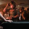 "All Along the Watchtower: Part 2" -- While on a mission abroad to protect U.S. ambassador Nicole Marsden (Khandi Alexander), Bravo Team must fight off enemy attackers trying to infiltrate their compound, on SEAL TEAM, Wednesday, Nov. 6 (9:01-10:00 PM, ET/PT) on the CBS Television Network. Pictured L to R: Max Thieriot as Clay Spenser and Neil Brown Jr. as Ray Perry. Photo: Erik Voake/CBS 2019 CBS Broadcasting, Inc. All Rights Reserved.