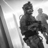 "All Along the Watchtower: Part 2" -- While on a mission abroad to protect U.S. ambassador Nicole Marsden (Khandi Alexander), Bravo Team must fight off enemy attackers trying to infiltrate their compound, on SEAL TEAM, Wednesday, Nov. 6 (9:01-10:00 PM, ET/PT) on the CBS Television Network. Pictured: Justin Melnick as Brock Reynolds. Photo: Aaron Epstein/CBS 2019 CBS Broadcasting, Inc. All Rights Reserved.