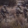 "Danger Crossing" -- While Jason is sidelined with an injury, Ray takes over as Bravo 1 and leads the team on a mission to rescue a marine pilot who was shot down in enemy territory, on SEAL TEAM, Wednesday, Nov. 27 (9:01-10:00 PM, ET/PT) on the CBS Television Network. Pictured L to R: Tyler Grey as Trent Sawyer, Neil Brown Jr. as Ray Perry, AJ Buckley as Sonny Quinn, and Max Thieriot as Clay Spenser. Photo: Erik Voake/CBS 2019 CBS Broadcasting, Inc. All Rights Reserved.