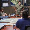 "Kill or Cure" -- Bravo team is on a mission to protect aid convoys in an Ebola hot zone after a warlord steals preserved samples of the virus that can be weaponized, on SEAL TEAM, Wednesday, Dec. 4 (9:00-10:00 PM, ET/PT) on the CBS Television Network. Pictured L to R: AJ Buckley as Sonny Quinn, Judd Lormand as Lt. Cdr. Eric Blackburn, and Neil Brown Jr. as Ray Perry. Photo: Michael Yarish/CBS ©2019 CBS Broadcasting, Inc. All Rights Reserved