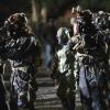 "Kill or Cure" -- Bravo team is on a mission to protect aid convoys in an Ebola hot zone after a warlord steals preserved samples of the virus that can be weaponized, on SEAL TEAM, Wednesday, Dec. 4 (9:00-10:00 PM, ET/PT) on the CBS Television Network. Pictured| Neil Brown Jr. as Ray Perry, Tyler Grey as Trent Sawyer, Max Thieriot as Clay Spenser. Photo: Erik Voake/CBS ©2019 CBS Broadcasting, Inc. All Rights Reserved