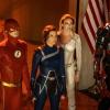 Supergirl -- "Crisis on Infinite Earths: Part One" -- Image Number: SPG509b_0410r.jpg -- Pictured (L-R): Grant Gustin as The Flash, Audrey Marie Anderson as Harbinger, Caity Lotz as Sara Lance/White Canary and Brandon Routh as Ray Palmer/Atom -- Photo: Katie Yu/The CW -- © 2019 The CW Network, LLC. All Rights Reserved.