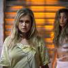 The 100 -- "Reapercussions" -- Image: HU203b_0027-- Pictured (L-R): Eliza Taylor as Clarke and Dichen Lachman as Anya -- Photo: Cate Cameron /The CW -- ÃÂ© 2014 The CW Network, LLC. All Rights Reserved