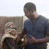 The 100 -- "Many Happy Returns" -- Image: HU204a_0662 -- Pictured (L-R): Finn Wolfhard as Zoran and Isaiah Washington as Jaha -- Photo: Katie Yu/The CW -- ÃÂ© 2014 The CW Network, LLC. All Rights Reserved