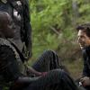 The 100 -- "Human Trials" -- Image: HU205a_0255 -- Pictured (L-R): Colin Lawrence as Rivo and Henry Ian Cusick as Kane -- Photo: Carole Segal/The CW -- ÃÂ© 2014 The CW Network, LLC. All Rights Reserved