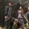 The 100 -- "Human Trials" -- Image: HU205B_0010 -- Pictured (L-R): Bob Morley as Bellamy, Lindsey Morgan as Raven, and Eliza Taylor as Clarke -- Photo: Cate Cameron/The CW -- ÃÂ© 2014 The CW Network, LLC. All Rights Reserved