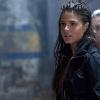 The 100 -- "Remember Me" -- Image: HU209B_0343 -- Pictured (L-R): Marie Avgeropoulos as Octavia and Lindsey Morgan as Raven -- Photo: Carole Segal /The CW -- ÃÂ© 2015 The CW Network, LLC. All Rights Reserved