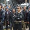 The 100 -- "A Lie Guarded" -- Image HU404a_0296 -- Pictured (Front L-R): Chris Larkin as Monty, Chelsey Reist as Harper, and Chris Shields as David Miller -- Credit: Bettina Strauss/The CW -- ÃÂ© 2017 The CW Network, LLC. All Rights Reserved