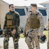 "P.O.G." -- Captains John Abraham and Maya Dobbins head to a war zone when they are assigned to opposite sides of the courtroom in the case of Marine charged with abandoning his post during combat, resulting in the deaths of three soldiers. Also, Major Trey Ferry must iron out a diplomatic spat, and Lt. Harper Li works to balance her duties to the Corps with planning her wedding, on THE CODE, Monday, April 15 (9:00-10:00 PM, ET/PT) on the CBS Television Network.  Pictured (L-R) Luke Mitchell as Captain John "Abe" Abraham, Phillipa Soo as Lieutenant Harper Li and Anna Wood as Captain Maya Dobbins   Photo: Best Possible Screen Grab/CBS 2018 CBS Broadcasting, Inc. All Rights Reserved