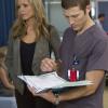 THE MOB DOCTOR: Grace (Jordana Spiro, L) and Brett (Zach Gilford, R) discuss a patient's health status in the &quot;Family Secrets&quot; episode of THE MOB DOCTOR airing Monday, Sept. 24 (9:00-10:00 PM ET/PT) on FOX. &#xa9;2012 Fox Broadcasting Co. CR: Chuck Hodes/FOX