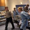 THE MOB DOCTOR: Brett (Zach Gilford, second from L) and Grace (Jordana Spiro, third from L) rush a patient into surgery in the &quot;Complications&quot; episode of THE MOB DOCTOR airing Monday, Nov. 12 (9:00-10:00 PM ET/PT) on FOX. &#xa9;2012 Fox Broadcasting Co. CR: Nathan Bell/FOX