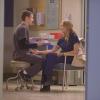THE MOB DOCTOR: Grace (Jordana Spiro, R) gets treated for a cut by Brett (Zach Gilford, L) in the &quot;Confessions&quot; episode of THE MOB DOCTOR airing Saturday, Dec. 29 (9:00-10:00 PM ET/PT) on FOX. &#xa9;2012 Fox Broadcasting Co. CR: Nathan Bell/FOX