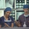 THE MOB DOCTOR: Grace (Jordana Spiro, L) and Brett (Zach Gilford, R) prepare for surgery in the &quot;Resurrection&quot; episode of THE MOB DOCTOR airing Saturday, Jan. 5 (9:00-10:00 PM ET/PT) on FOX. &#xa9;2012 Fox Broadcasting Co. CR: Nathan Bell/FOX