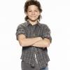 YOUNG SHELDON stars Montana Jordan as Georgie in a new half-hour, single-camera comedy created by Chuck Lorre and Steven Molaro that introduces "The Big Bang Theory\'s" Sheldon Cooper, a 9-year-old genius living with his family in East Texas and going to high school. YOUNG SHELDON will have a special Monday launch behind the season premiere of THE BIG BANG THEORY on Sept. 25 (8:30-9:00 PM, ET/PT). On Nov. 2, YOUNG SHELDON will move to its regular time period, Thursdays (8:30-9:00 PM, ET/PT) on the CBS Television Network. Photo: Smallz + Raskind/Warner Bros. Entertainment Inc. ÃÂ© 2017 WBEI. All rights reserved.