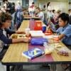 "Rockets, Communists, and the Dewey Decimal System"-- Pictured: Georgie (Montana Jordan), Tam (Ryan Phuong) and Sheldon (Iain Armitage). To appease his worried mother, Sheldon employs the techniques of a self-help book to try and make a friend, when YOUNG SHELDON returns in its new time period, Thursday, Nov. 2 (8:31-9:01 PM, ET/PT) on the CBS Television Network.  Photo: Sonja Flemming/CBS ÃÂ©2017 CBS Broadcasting, Inc. All Rights Reserved.