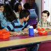 "Rockets, Communists, and the Dewey Decimal System"-- Pictured: Tam (Ryan Phuong) and Sheldon (Iain Armitage). To appease his worried mother, Sheldon employs the techniques of a self-help book to try and make a friend, when YOUNG SHELDON returns in its new time period, Thursday, Nov. 2 (8:31-9:01 PM, ET/PT) on the CBS Television Network.  Photo: Sonja Flemming/CBS ÃÂ©2017 CBS Broadcasting, Inc. All Rights Reserved.