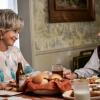 "Family Dynamics and a Red Fiero"- Pictured: Meemaw (Annie Potts) and Dr. John Sturgis (Wallace Shawn). A Thanksgiving dinner turns into a family fight when George Sr. is offered a job in Oklahoma, on YOUNG SHELDON, Thursday, Nov. 15 (8:31-9:01 PM, ET/PT) on the CBS Television Network. Photo: Cliff Lipson/CBS ÃÂ©2018 CBS Broadcasting, Inc. All Rights Reserved.