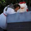 DADS: Edna (Tonita Castro, L) and David (Peter Riegert, R) contemplate how to get Eli, Warner, Veronica and Crawford out of a chimney in the &quot;The Glitch That Stole Christmas&quot; episode of DADS airing Tuesday, Dec. 3 (8:00-8:30 PM ET/PT) on FOX. &#xa9;2013 Fox Broadcasting Co. Cr: Greg Gayne/FOX