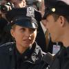 "Baggage" -- Danny is conflicted when he learns that a group of highly trained Army veterans are responsible for a robbery. Meanwhile, after a bomb scare in a subway turns out to be the work of a famous street artist, Garrett and Gormley argue about how to deal with the fallout, on the 100th episode of BLUE BLOODS, on the CBS Television Network.   Pictured: Vanessa Ray as Eddie Janko, Will Estes as Jamie Reagan. Photo: CBS  ÃÂ©2014 CBS Broadcasting Inc. All Rights Reserved.