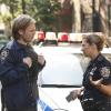 "All the News That\'s Fit To Click" -- When newspaper reporter Lorenzo Colt (Zachary Booth) is targeted while wearing NYPD gear on a ride-along with Jamie and Eddie, Frank puts Danny and Baez on the hunt for the shooter who may be out for other members on the force.  Also, Garrett contemplates taking another job, on BLUE BLOODS, Friday, Oct. 9 (10:00-11:00 PM, ET/PT) on the CBS Television Network. Pictured: Zachary Booth as Lorenzo Colt, Vanessa Ray as Eddie Janko. Photo: Craig Blankenhorn/CBS ÃÂ©2015CBS Broadcasting Inc. All Rights Reserved.