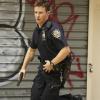 "All the News That\'s Fit To Click" -- When newspaper reporter Lorenzo Colt (Zachary Booth) is targeted while wearing NYPD gear on a ride-along with Jamie and Eddie, Frank puts Danny and Baez on the hunt for the shooter who may be out for other members on the force.  Also, Garrett contemplates taking another job, on BLUE BLOODS, Friday, Oct. 9 (10:00-11:00 PM, ET/PT) on the CBS Television Network. Pictured: Will Estes as Jamie Reagan. Photo: Craig Blankenhorn/CBS ÃÂ©2015CBS Broadcasting Inc. All Rights Reserved.