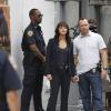 "All the News That\'s Fit To Click" -- When newspaper reporter Lorenzo Colt (Zachary Booth) is targeted while wearing NYPD gear on a ride-along with Jamie and Eddie, Frank puts Danny and Baez on the hunt for the shooter who may be out for other members on the force.  Also, Garrett contemplates taking another job, on BLUE BLOODS, Friday, Oct. 9 (10:00-11:00 PM, ET/PT) on the CBS Television Network. Pictured: Marisa Ramirez as Det. Maria Baez, Donnie Wahlberg as Donnie Reagan. Photo: Craig Blankenhorn/CBS ÃÂ©2015CBS Broadcasting Inc. All Rights Reserved.