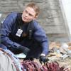 BONES:  Brennan (Emily Deschanel) investigates remains found in a storm drain in the "The Purging of the Pundit" episode of BONES airing Thursday, Oct. 9 (8:00-9:00 PM ET/PT) on FOX.  ©2014 Fox Broadcasting Co.  Cr:  Patrick McElhenney/FOX