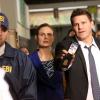 BONES: Brennan (Emily Deschanel, L) and Booth (David Boreanaz, R) visit the school campus of an affluent teacher that is found dead and the students have become suspects, in the "The Teacher in the Books" episode of BONES airing Thursday, April 2 (8:00-9:00 PM ET/PT) on FOX. Pictured ©2015 Fox Broadcasting Co. Cr: Patrick McElhenney/FOX
