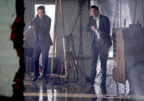 BONES:  Booth (David Boreanaz, R) and Aubrey (John Boyd, L) find the body of an ex-con in the "The Baker In The Bits" episode of BONES airing Thursday, April 9 (8:00-9:00 PM ET/PT) on FOX. ©2015 Fox Broadcasting Co. Cr: Jordin Althaus/FOX